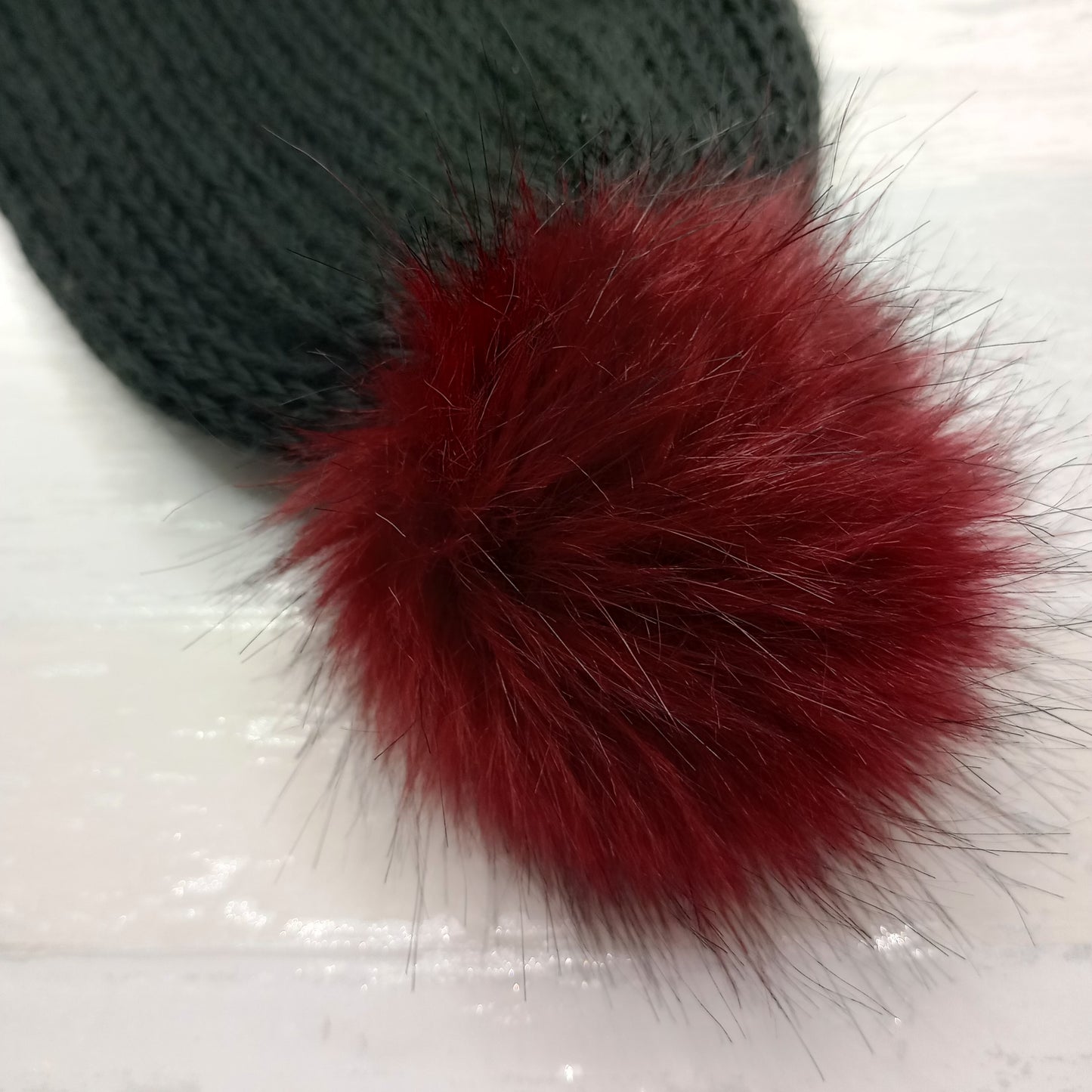 Adult Knitted black hat with a Red Pompom