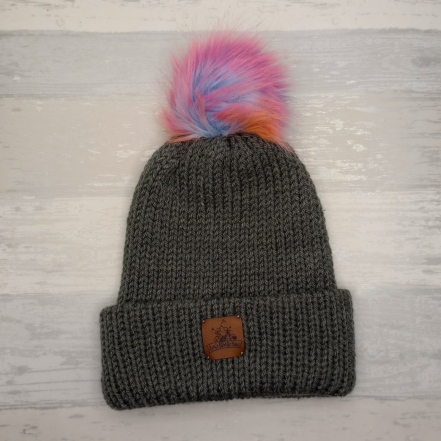 Adult Knitted Grey hat with a Rainbow Pompom