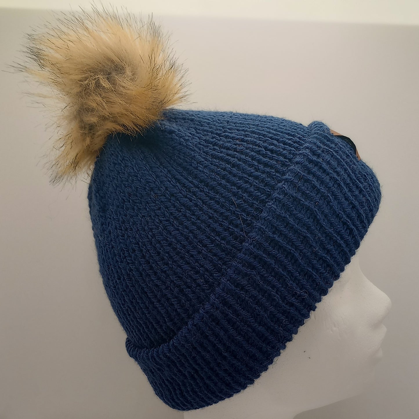 Knitted Navy Hat with a Pompom