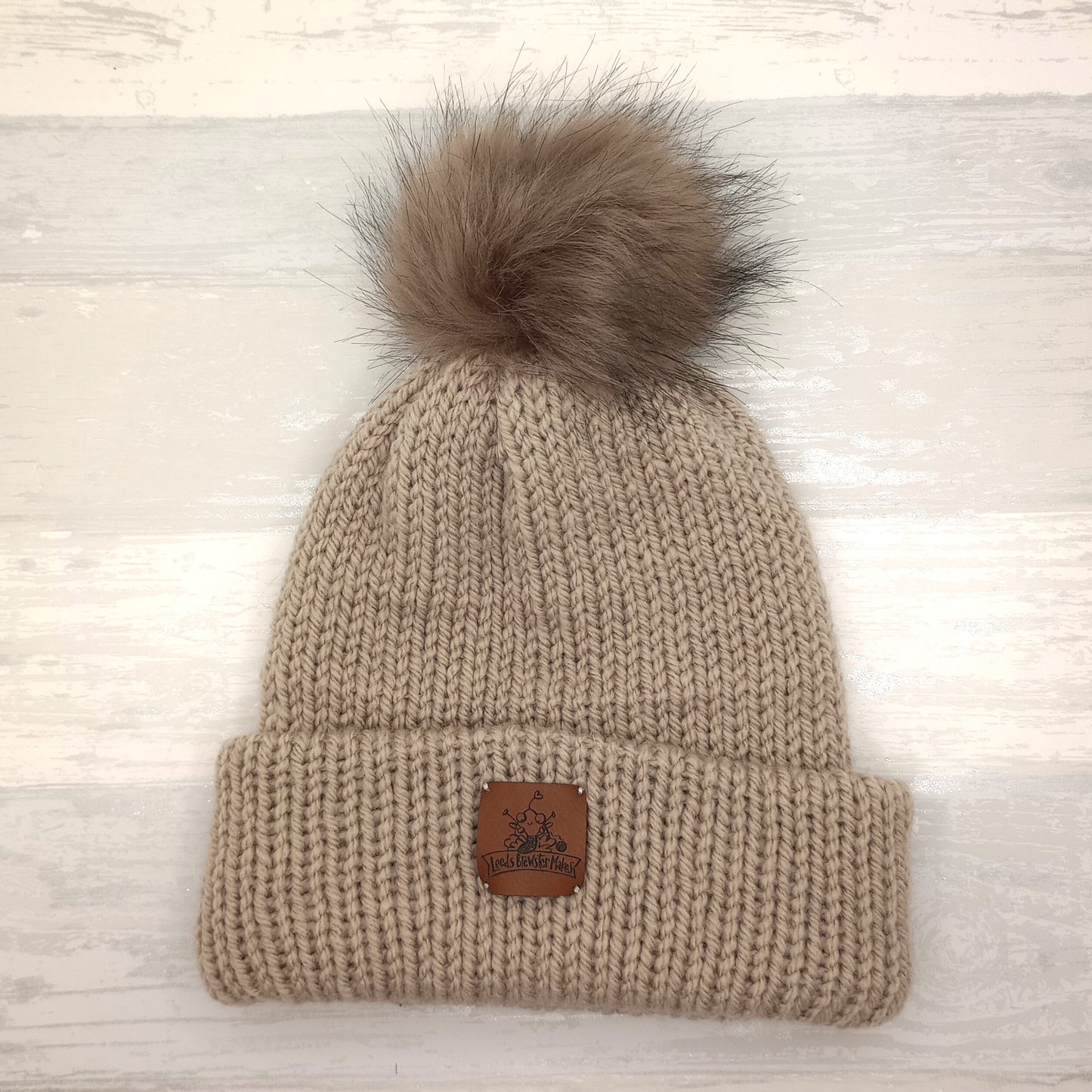 Adult Knitted Tan Hat with a Pompom