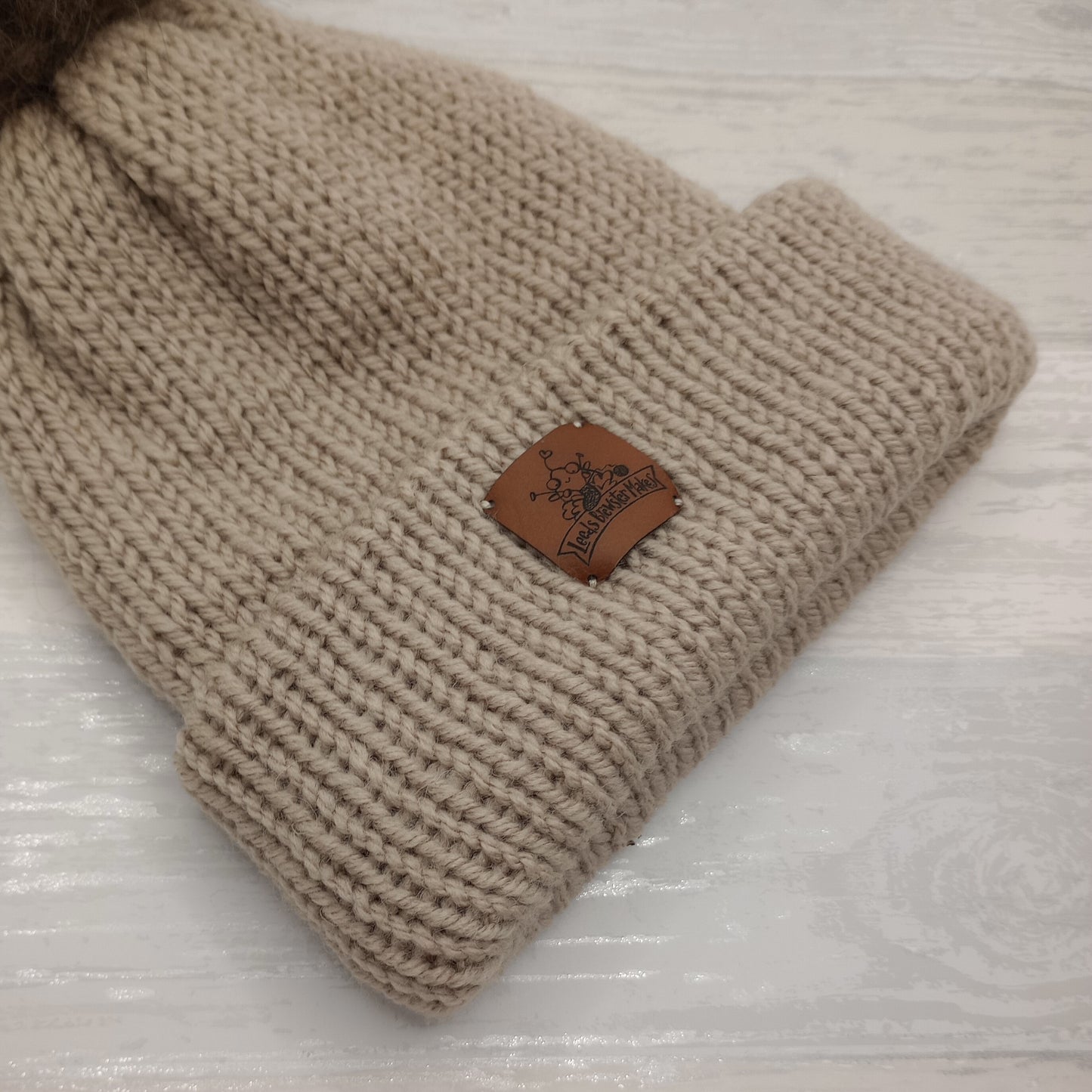 Adult Knitted Tan Hat with a Pompom